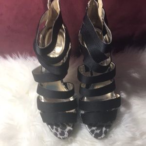 Black and cheetah print strapped heels